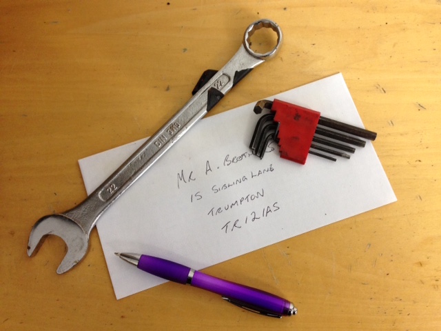Envelope-with-pen-spanner-tools-photo
